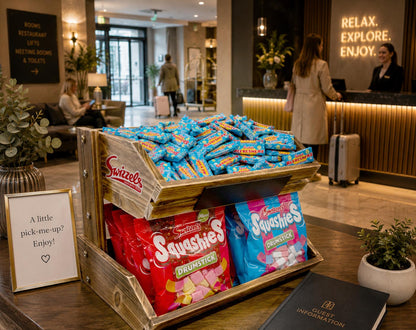 Display of Sweetsie candy packets in a hotel lobby.