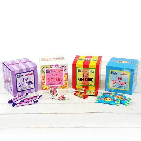 Colorful tea gift cubes on a white surface